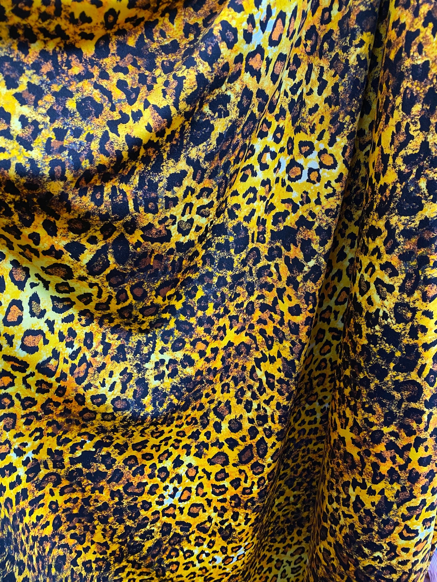 New print nylon spandex animal print leopard design 4-way stretch 58/60” Sold by the YD. Ships worldwide from Los Angeles California USA.