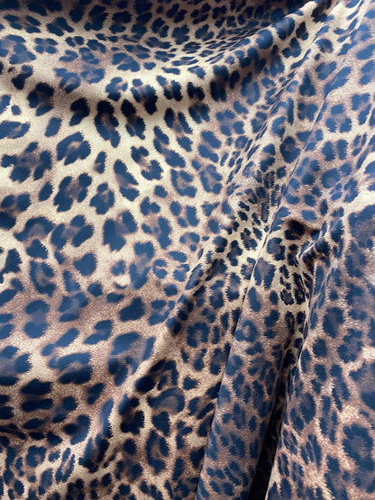 New print nylon spandex leopard design brown/taupe 4-way stretch 58/60” Sold by the YD. Ships worldwide from Los Angeles California USA.