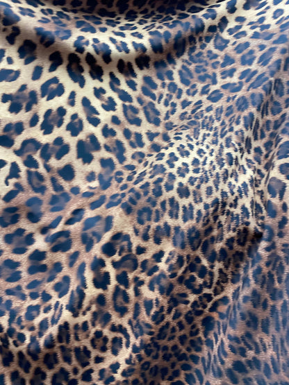 New print nylon spandex leopard design brown/taupe 4-way stretch 58/60” Sold by the YD. Ships worldwide from Los Angeles California USA.