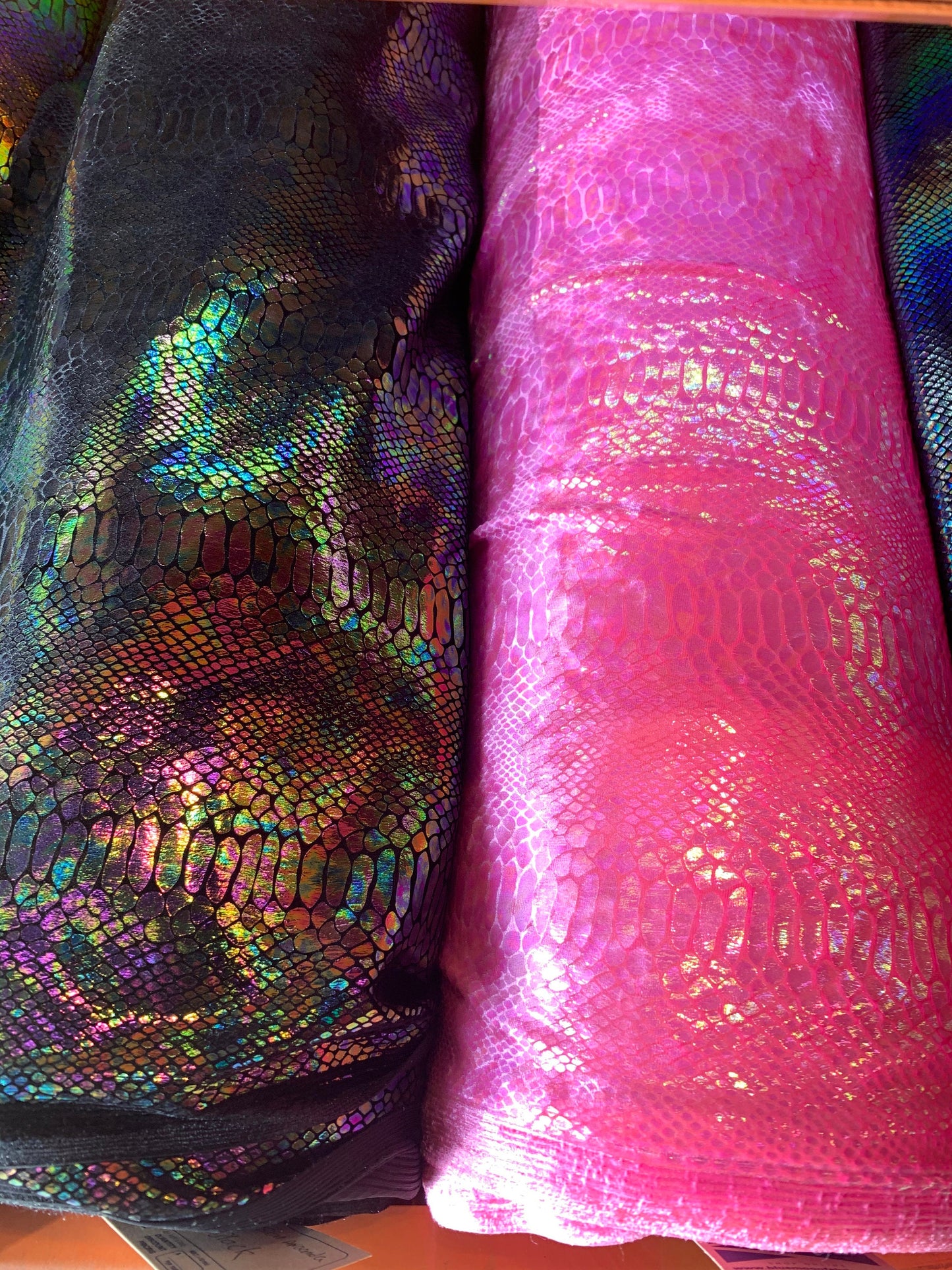 New Iridescent Alligator design hologram clear ilusión foil on heavy stretch velvet 4way stretch 58/60" Sold by the YD. Ships worldwide.