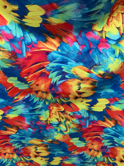 Feathers design print on nylon spandex with clear foil 4way Stretch 58/60" Sold by the YD. Ships worldwide from Los Angeles California USA