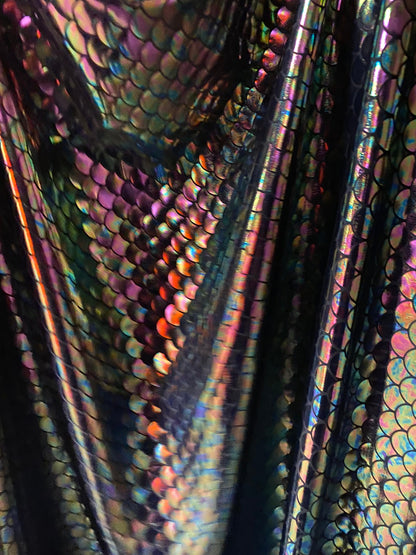 New iridescent black mermaid design on nylon spandex 4way Stretch 58/60” Sold bu the YD. ships worldwide from Los Angeles California USA.