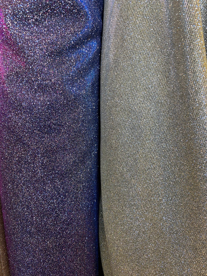 New lame metallic spandex with glitter 2-way stretch 58/60” Sold by the YD. Ships worldwide from Los Angeles California USA.