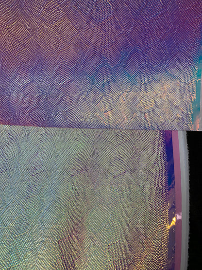 New snake design iridescent vinyl non stretch 58/60” Sold by the YD. Ships worldwide from Los Angeles California USA.