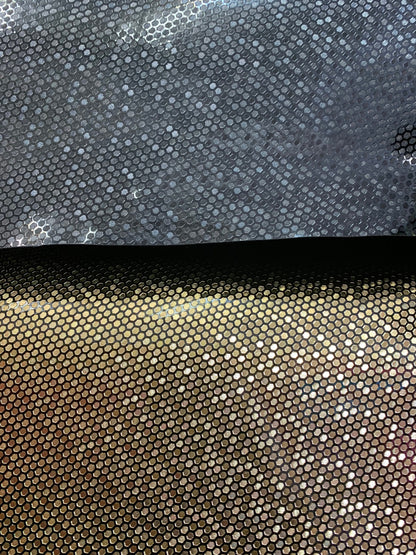 New honeycomb design shining metallic non stretch vinyl 58/60” Sold by the YD. Ships worldwide from Los Angeles California USA.