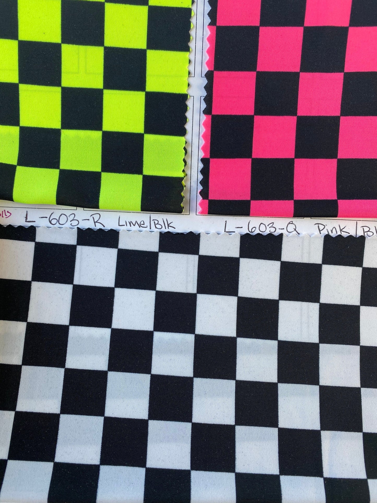 New poly spandex checkers design 4-way stretch 58/60” Sold by the YD. Ships worldwide from Los Angeles California USA.