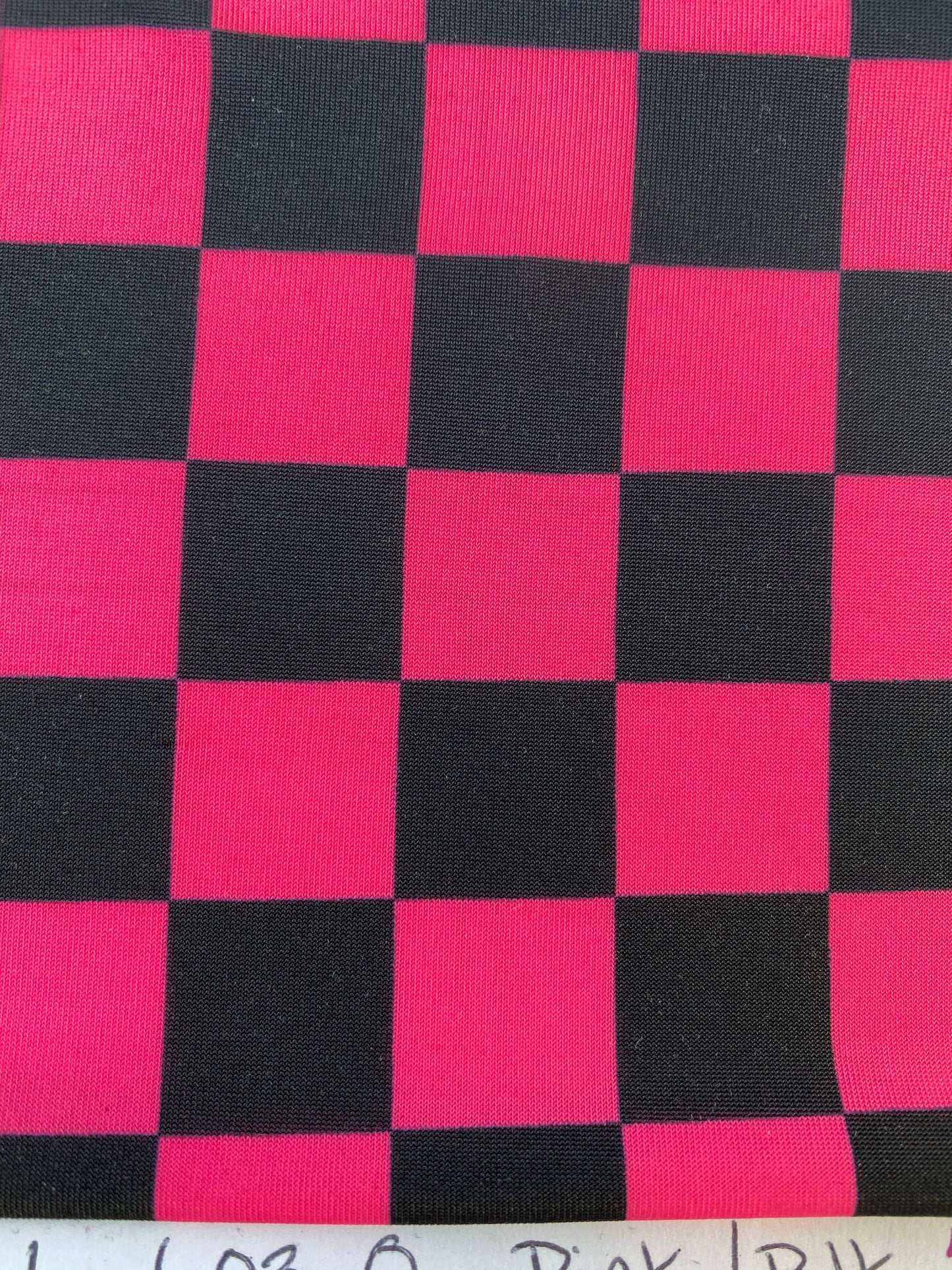 New poly spandex checkers design 4-way stretch 58/60” Sold by the YD. Ships worldwide from Los Angeles California USA.