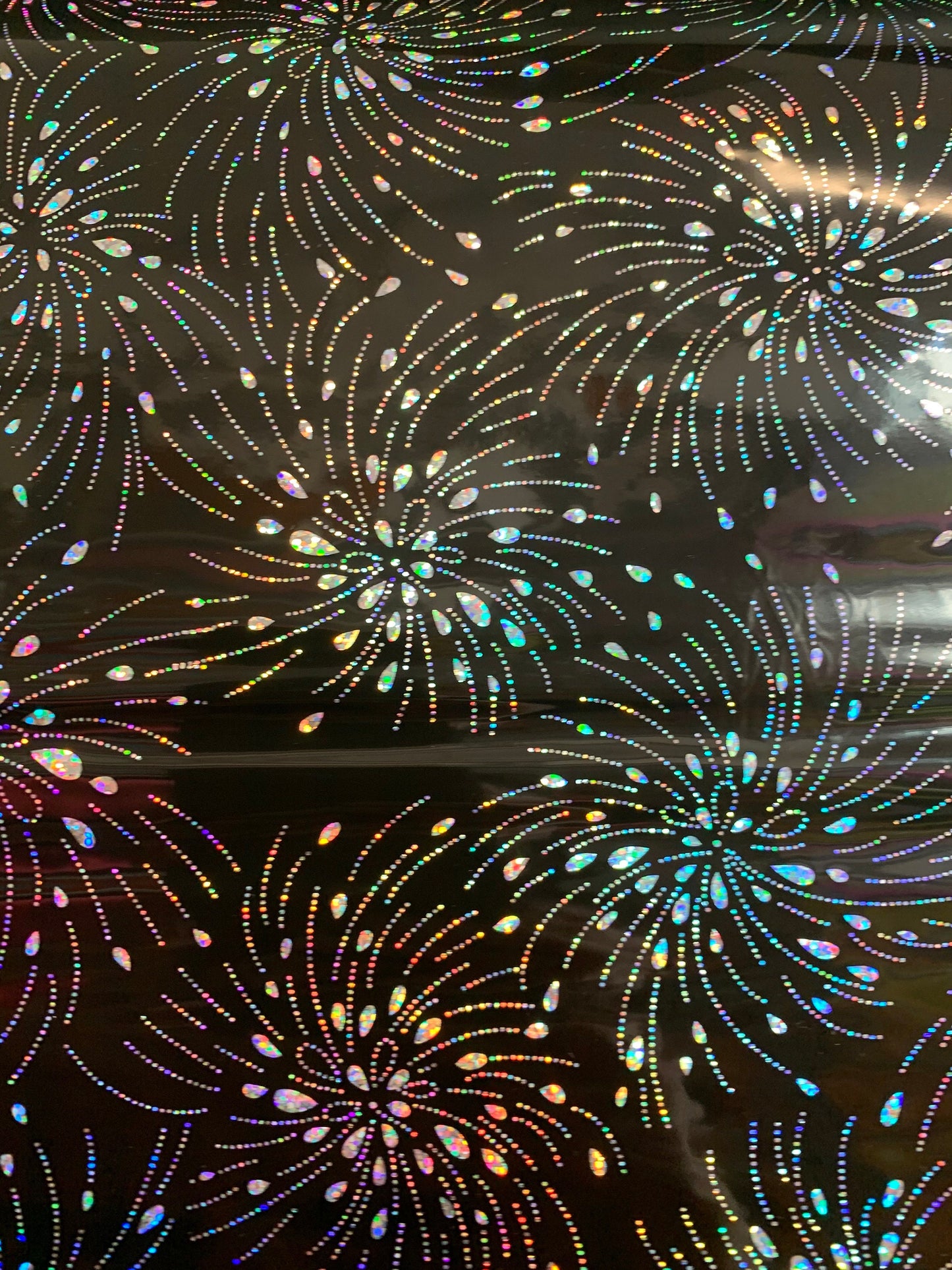 New spandex shining vinyl fireworks design 2-way Stretch 58/60” Sold by the YD. Ships worldwide from Los Angeles California USA.