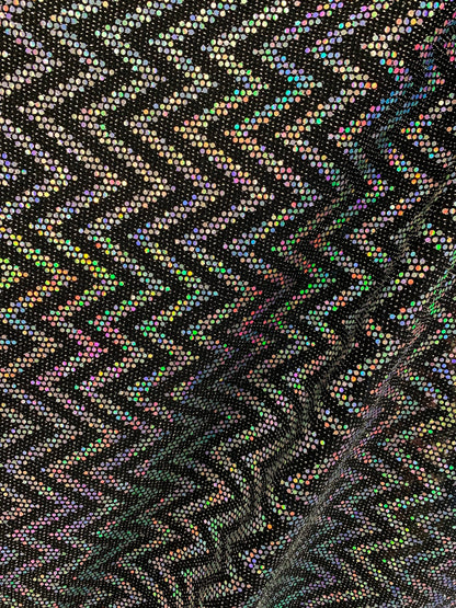 New zig zag hologram sequins design on stretch metallic spandex 2-way 58/60” Sold by the YD. Ships worldwide from Los Angeles California USA