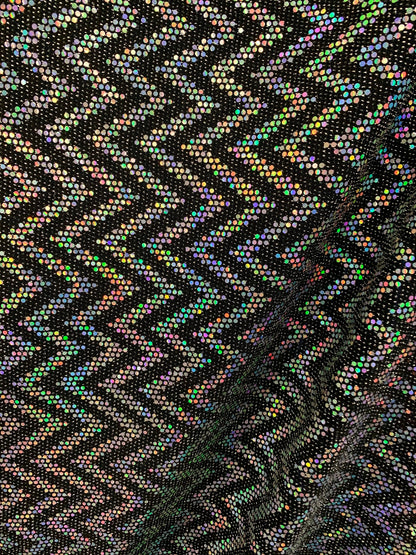 New zig zag hologram sequins design on stretch metallic spandex 2-way 58/60” Sold by the YD. Ships worldwide from Los Angeles California USA