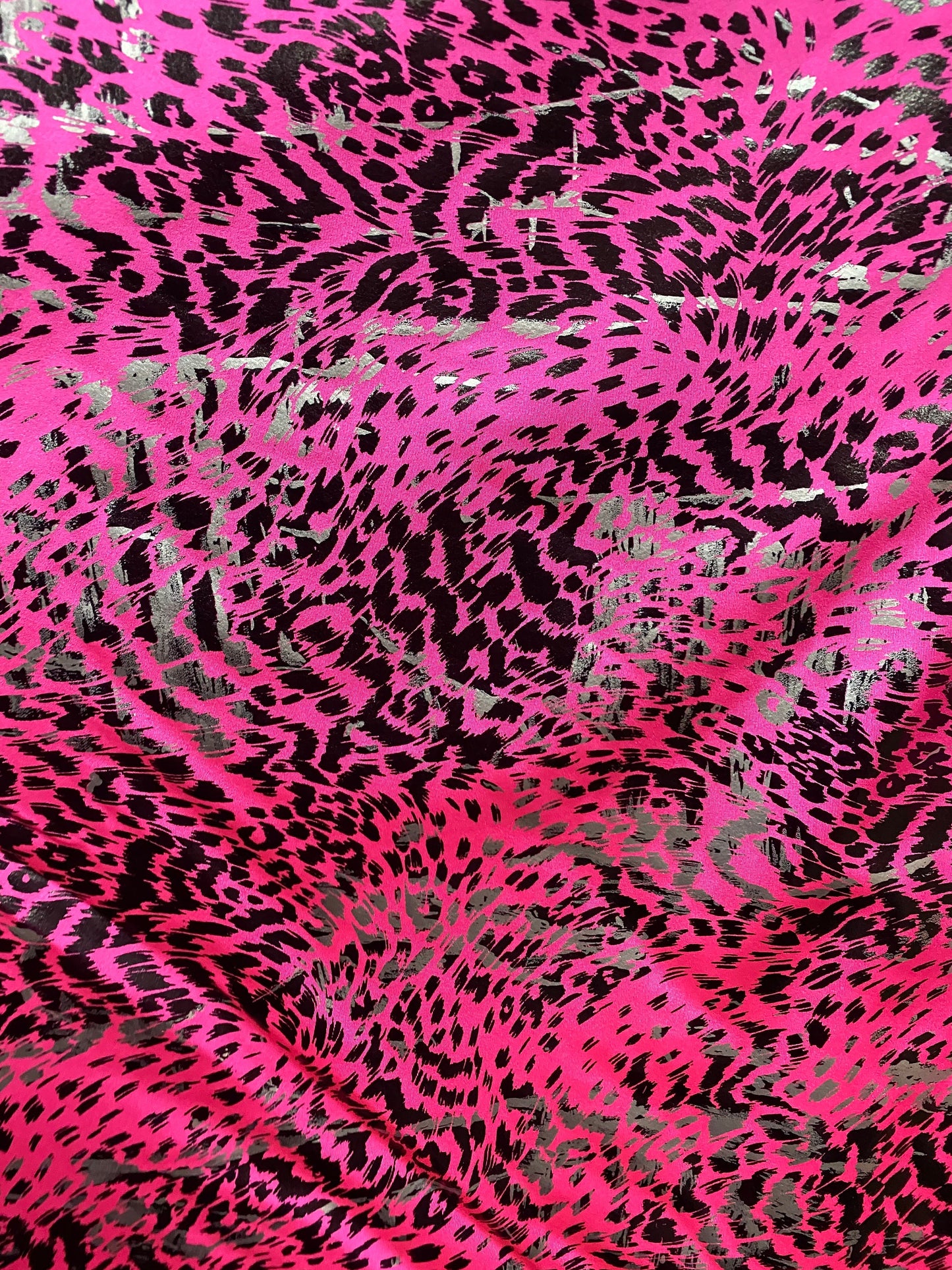 New Exotic animal print metallic nylon spandex pink/black 4-way stretch 58/60” Sold by the YD. Ships worldwide from Los Angeles California.