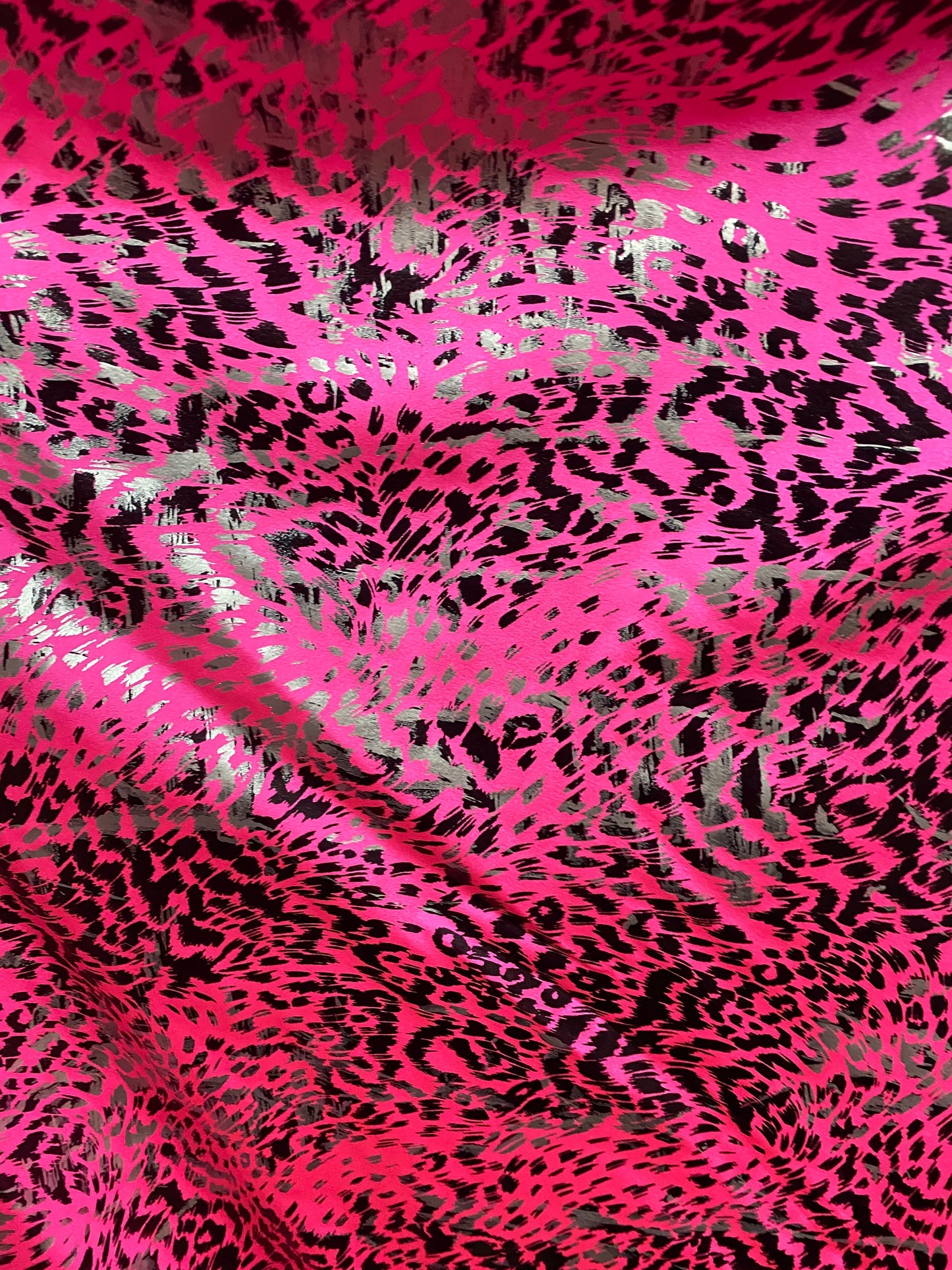 New Exotic animal print metallic nylon spandex pink/black 4-way stretch 58/60” Sold by the YD. Ships worldwide from Los Angeles California.