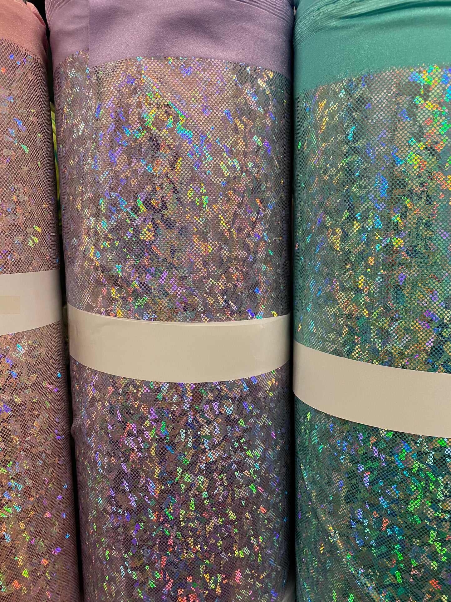 New shattered glass hologram metallic nylon Spandex 4-way Stretch 58/60” Sold by the YD. Ships worldwide from Los Angeles California USA.