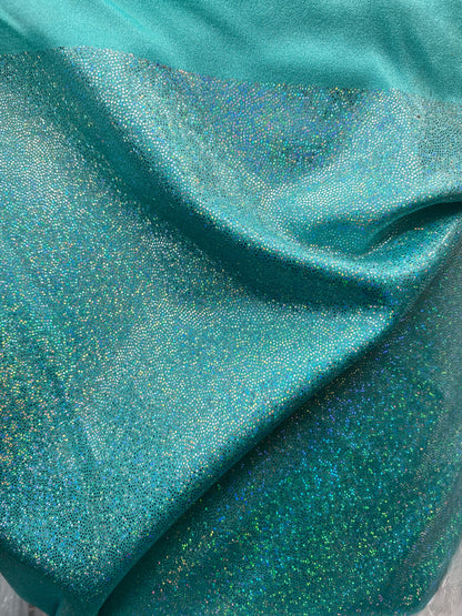 Sparkle hologram metallic nylon spandex 4way stretch 58/60” Sold by the YD. Ships worldwide from Los Angeles California USA.