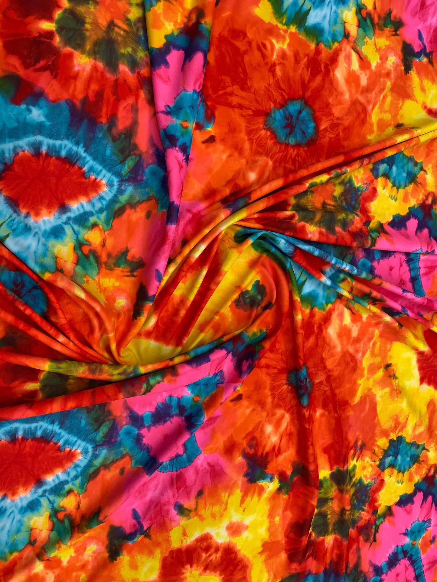 LAVA design, tie dye design nylon spandex 4way stretch 58/60" Sold by the YD. Ships worldwide from Los Angeles California USA.