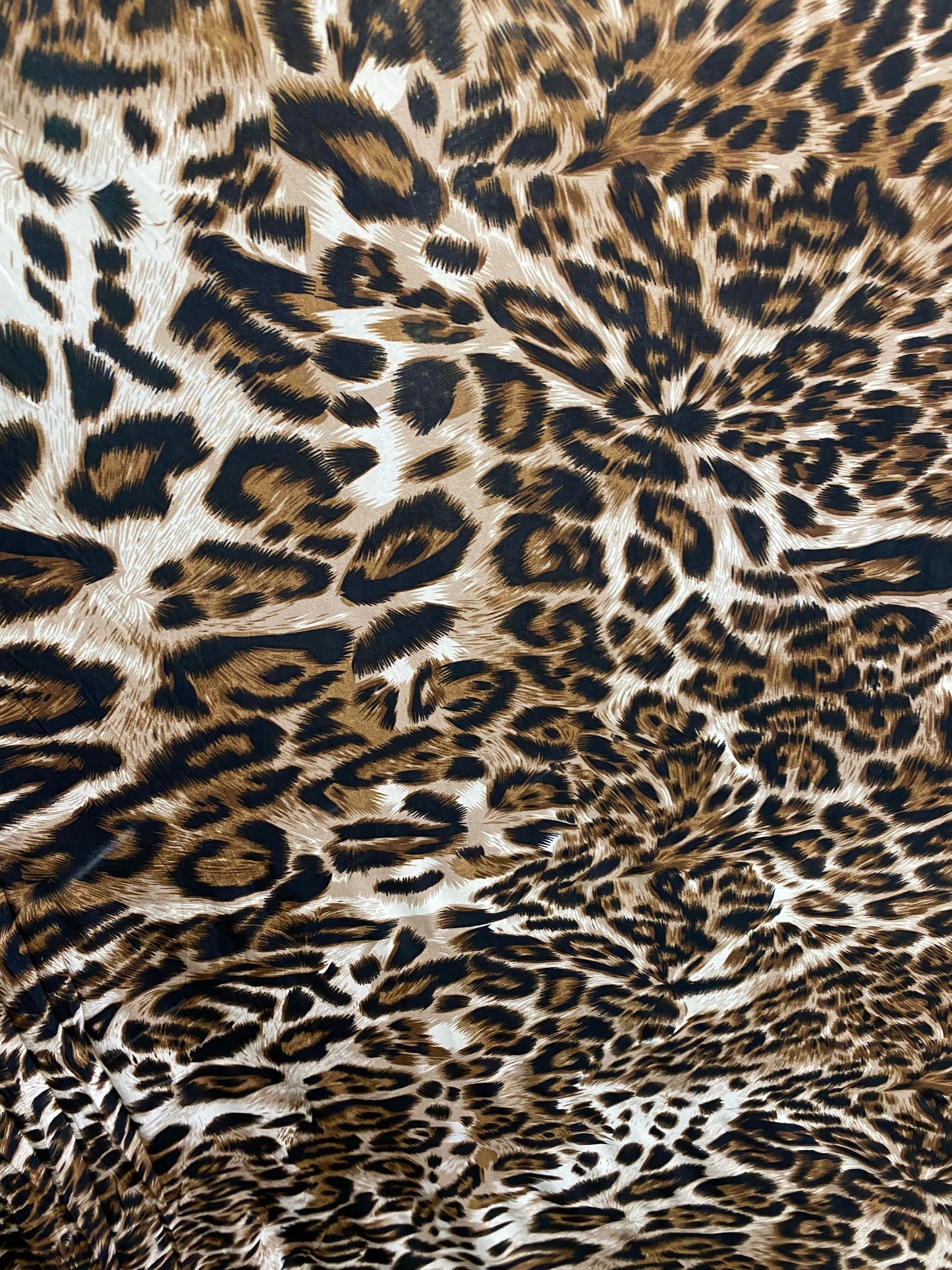 New leopard design print on poly spandex 4-way stretch 58/60” Sold by the YD. Ships worldwide from Los Angeles California USA.