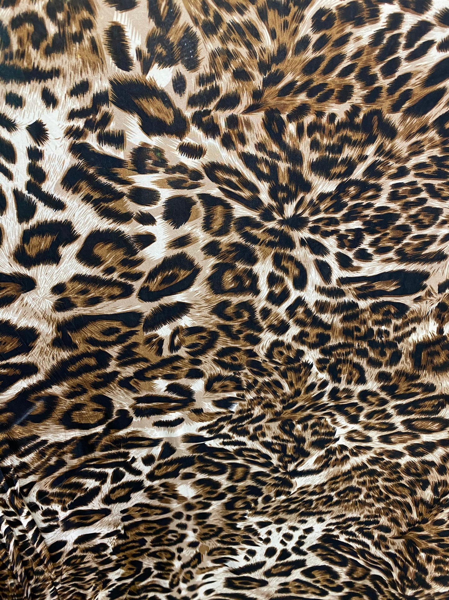 New leopard design print on poly spandex 4-way stretch 58/60” Sold by the YD. Ships worldwide from Los Angeles California USA.