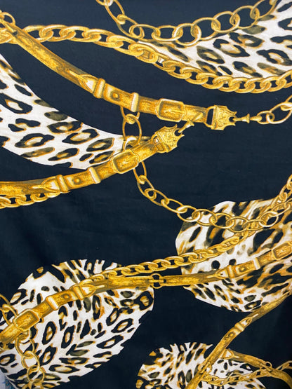 New Black and Gold print Chains all over on DTY brush 4-way stretch poly spandex fabric 58/60” Sold by the YD. Ships Los Ángeles CA.