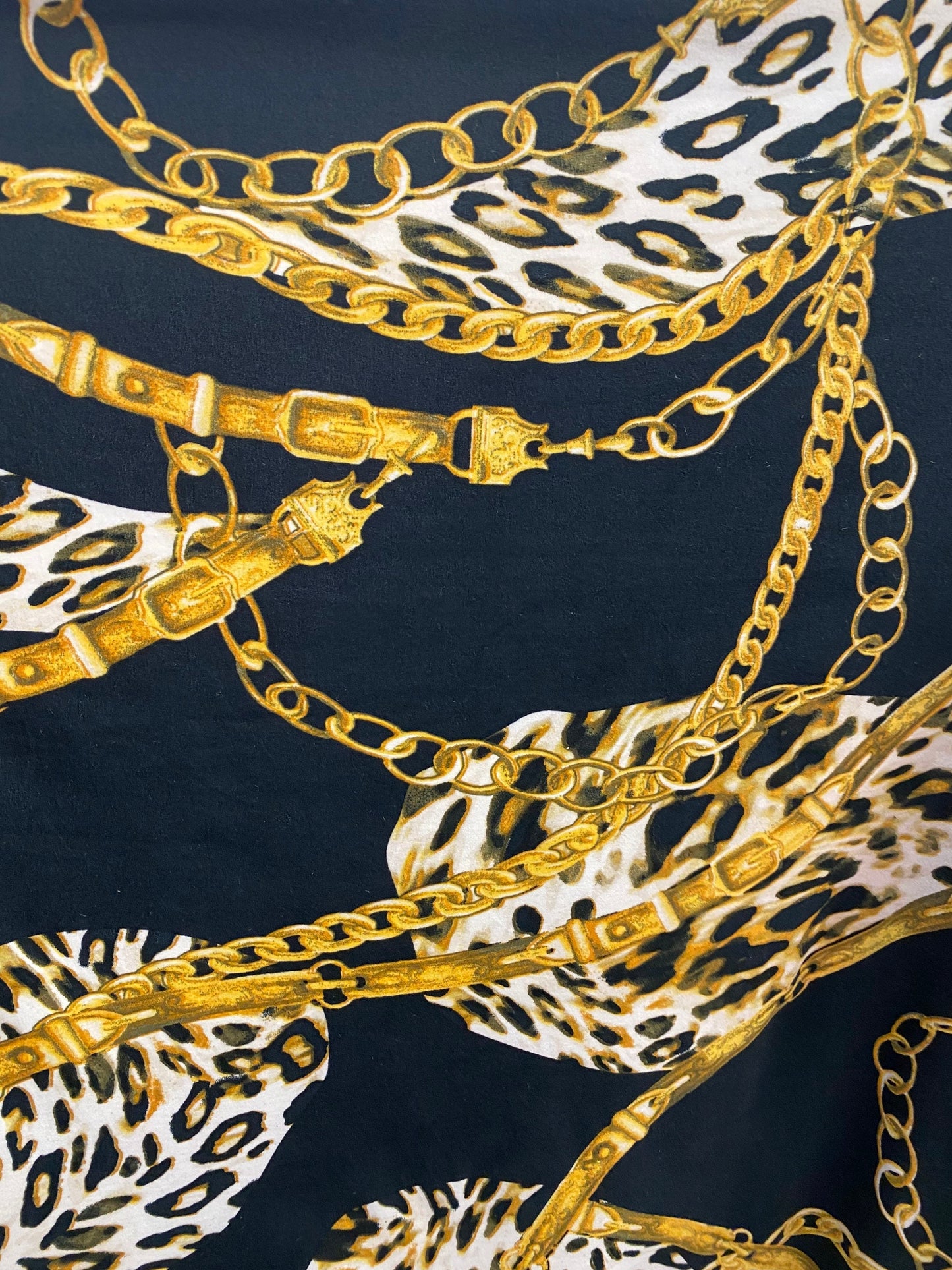 New Black and Gold print Chains all over on DTY brush 4-way stretch poly spandex fabric 58/60” Sold by the YD. Ships Los Ángeles CA.