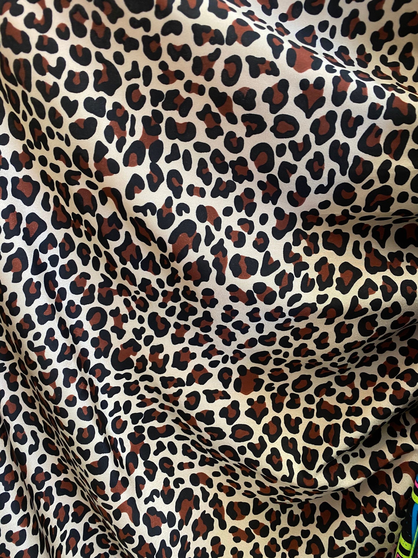 New leopard design animal print on  nylon spandex 4-way 58/60” Sold by the YD. Ships worldwide from Los Angeles California USA.