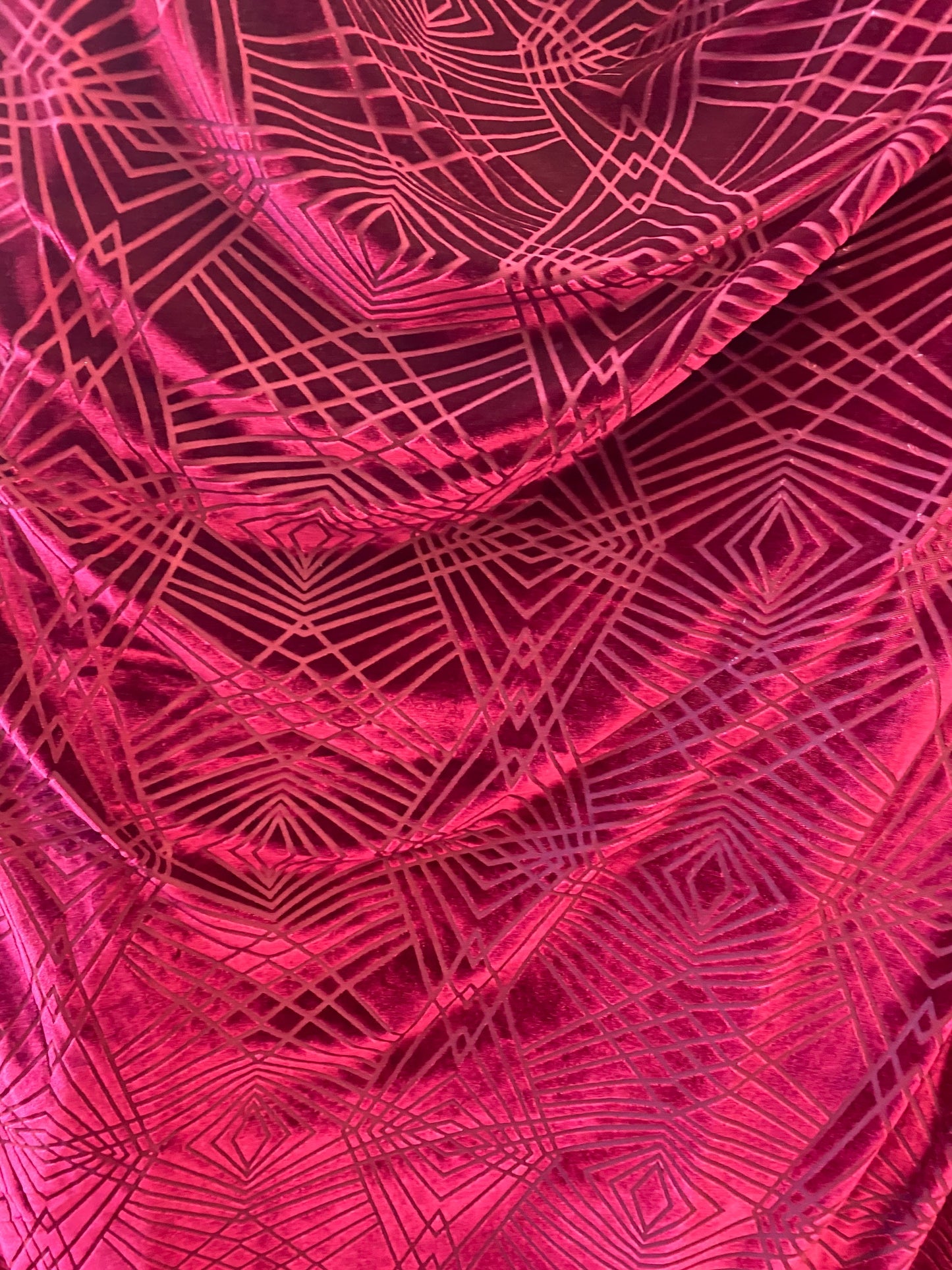 New burnout Geometric design magenta color 4-way stretch 58/60” Sold by the YD. Ships worldwide from Los Angeles California USA.