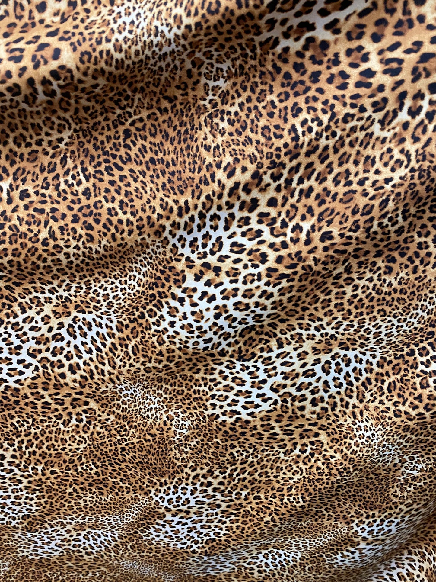 New Safari leopard design print on nylon spandex 4-way stretch 58/60” Sold by the YD. Ships worldwide from Los Angeles California USA.