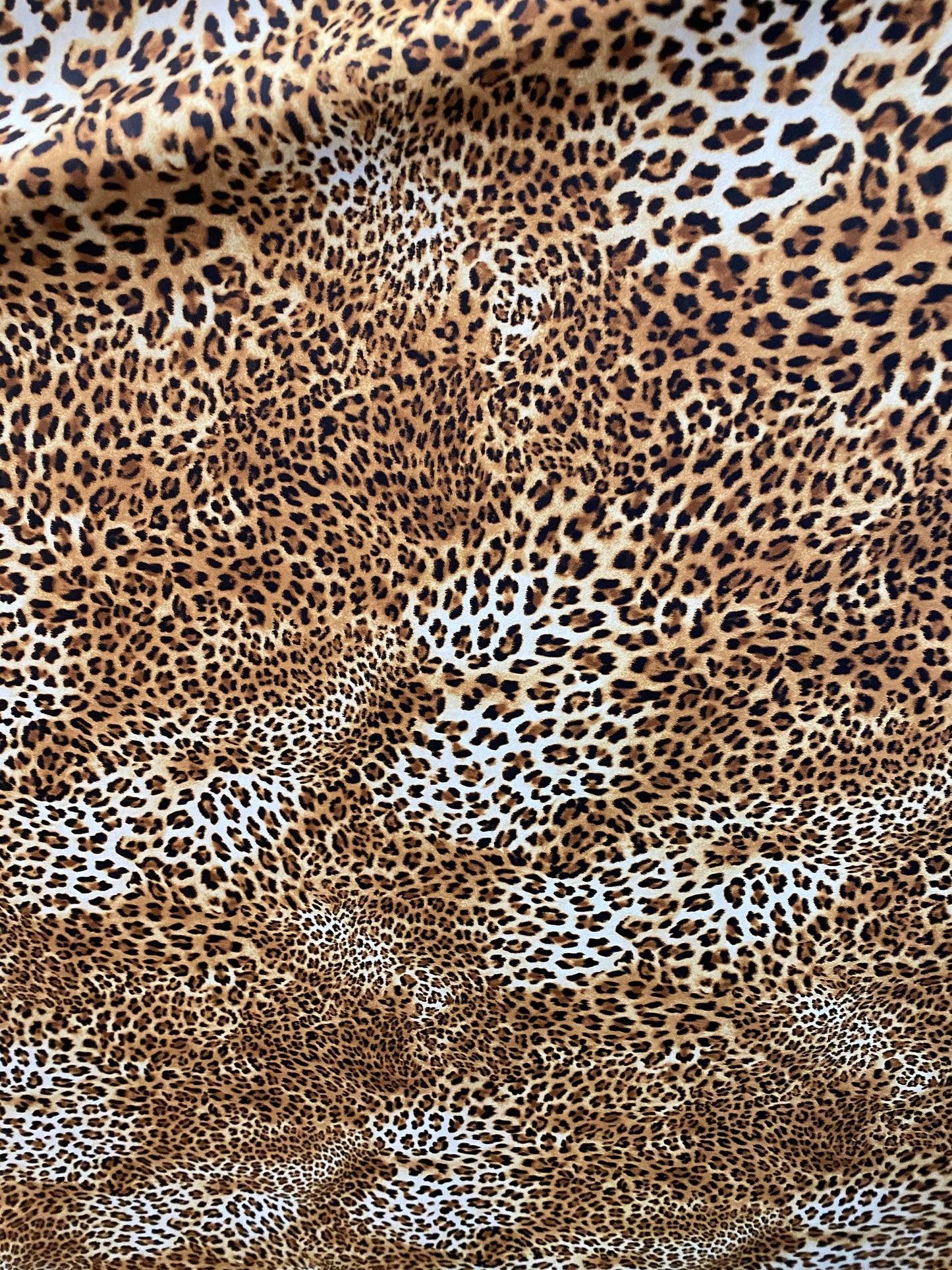 New Safari leopard design print on nylon spandex 4-way stretch 58/60” Sold by the YD. Ships worldwide from Los Angeles California USA.