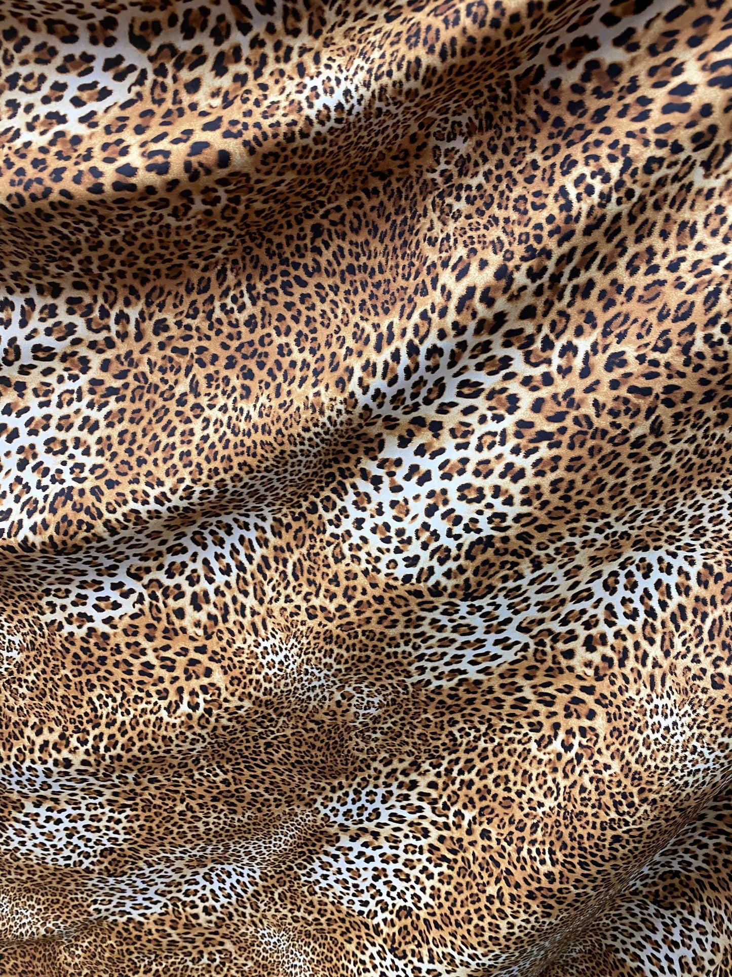 New Safari leopard design print on nylon spandex 4-way stretch 58/60” Sold by the YD. Ships worldwide from Los Angeles California USA.