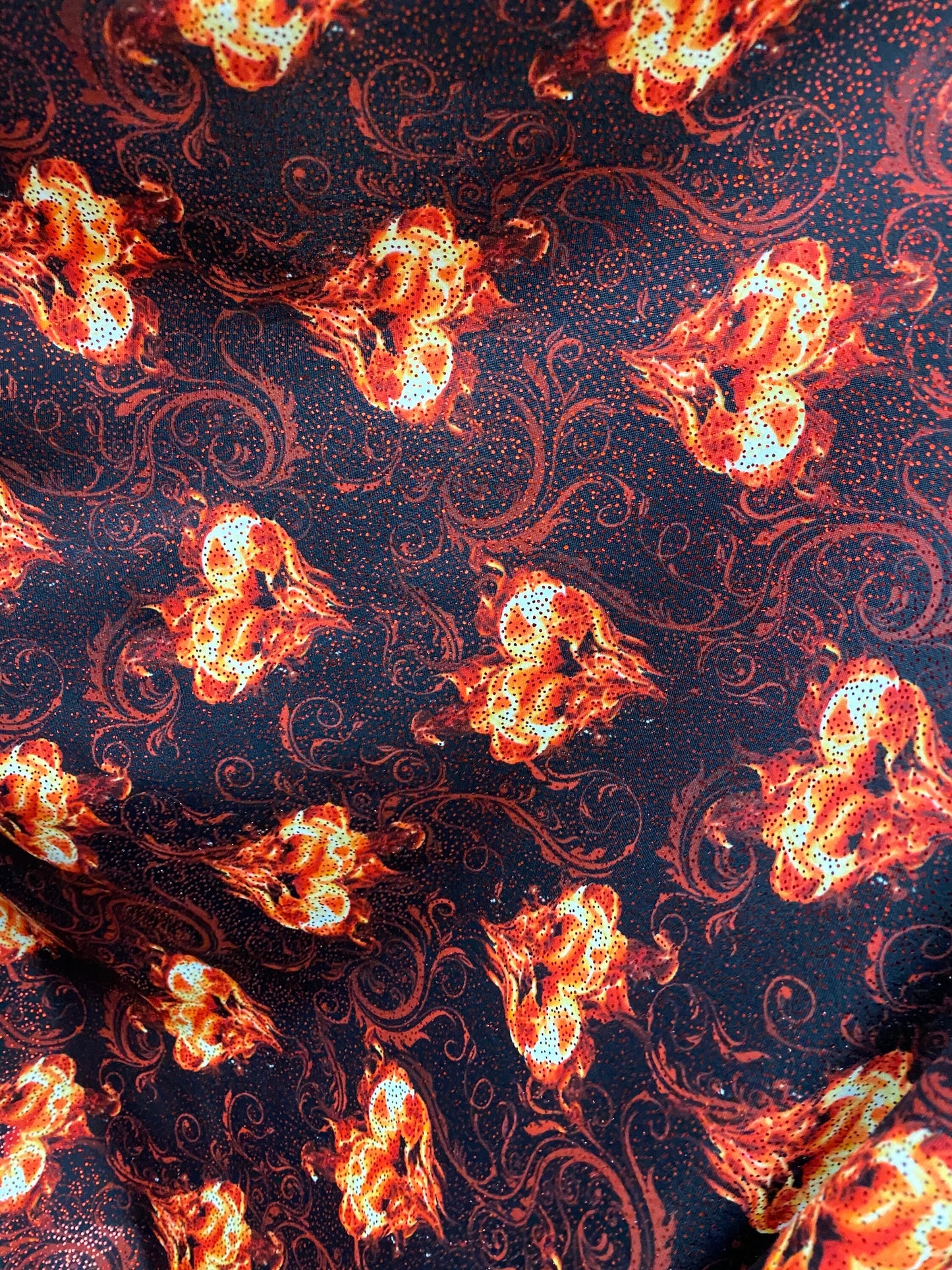 Fire Hot Desire design print nylon spandex with  metallic foil all over 4-way stretch 58/60” Sold by the YD. Ships worldwide from L.A CA USA