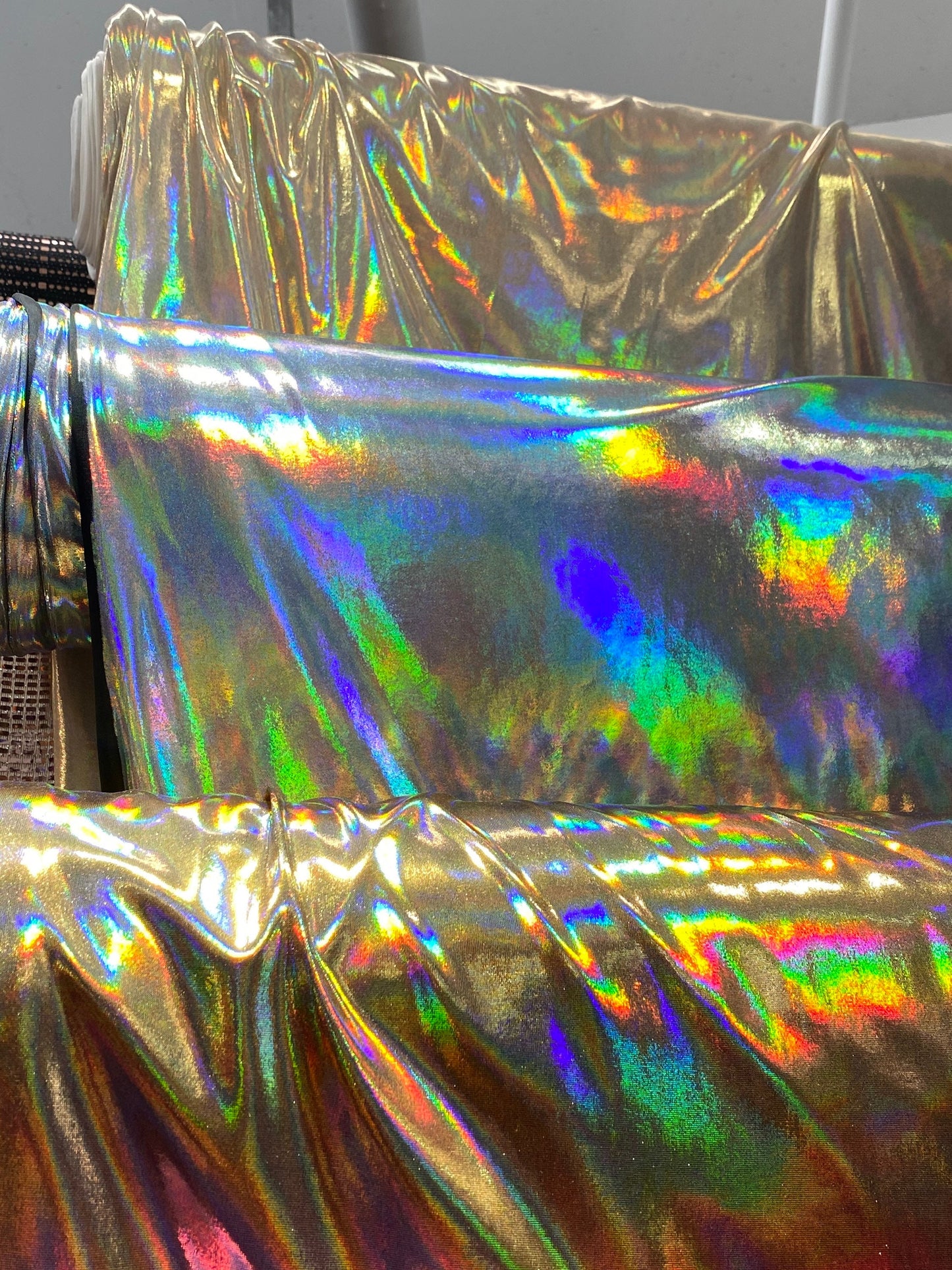 New Iridescent metallic foil on poly spandex medium weight 2-way stretch 58/60” Sold by the YD. Ships worldwide from Los Angeles California.