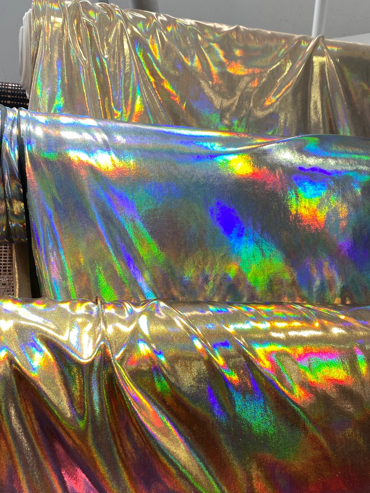 New Iridescent metallic foil on poly spandex medium weight 2-way stretch 58/60” Sold by the YD. Ships worldwide from Los Angeles California.