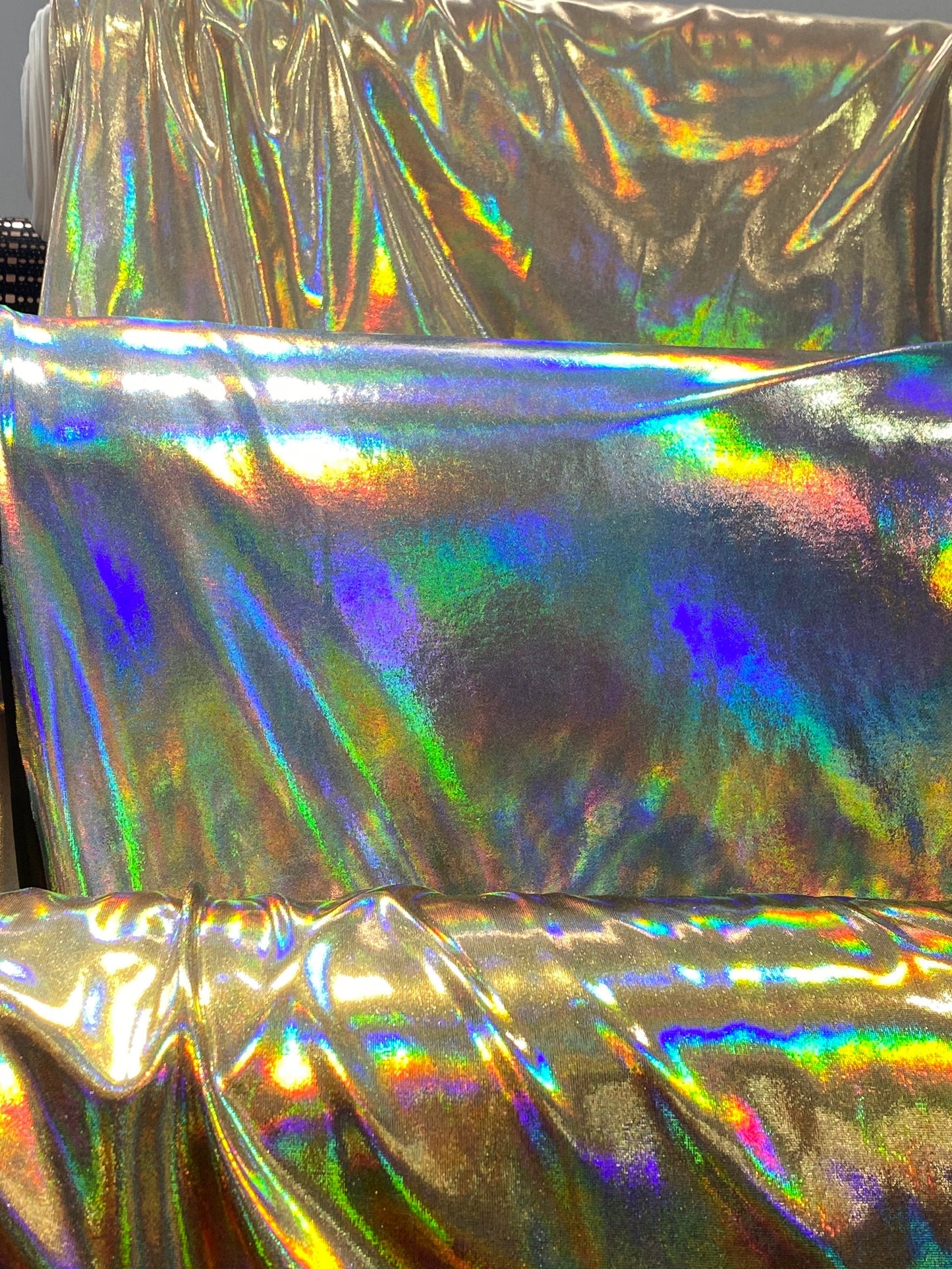 New Iridescent metallic foil on poly spandex medium weight 2-way stretch 58/60” Sold by the YD. Ships worldwide from Los Angeles California.