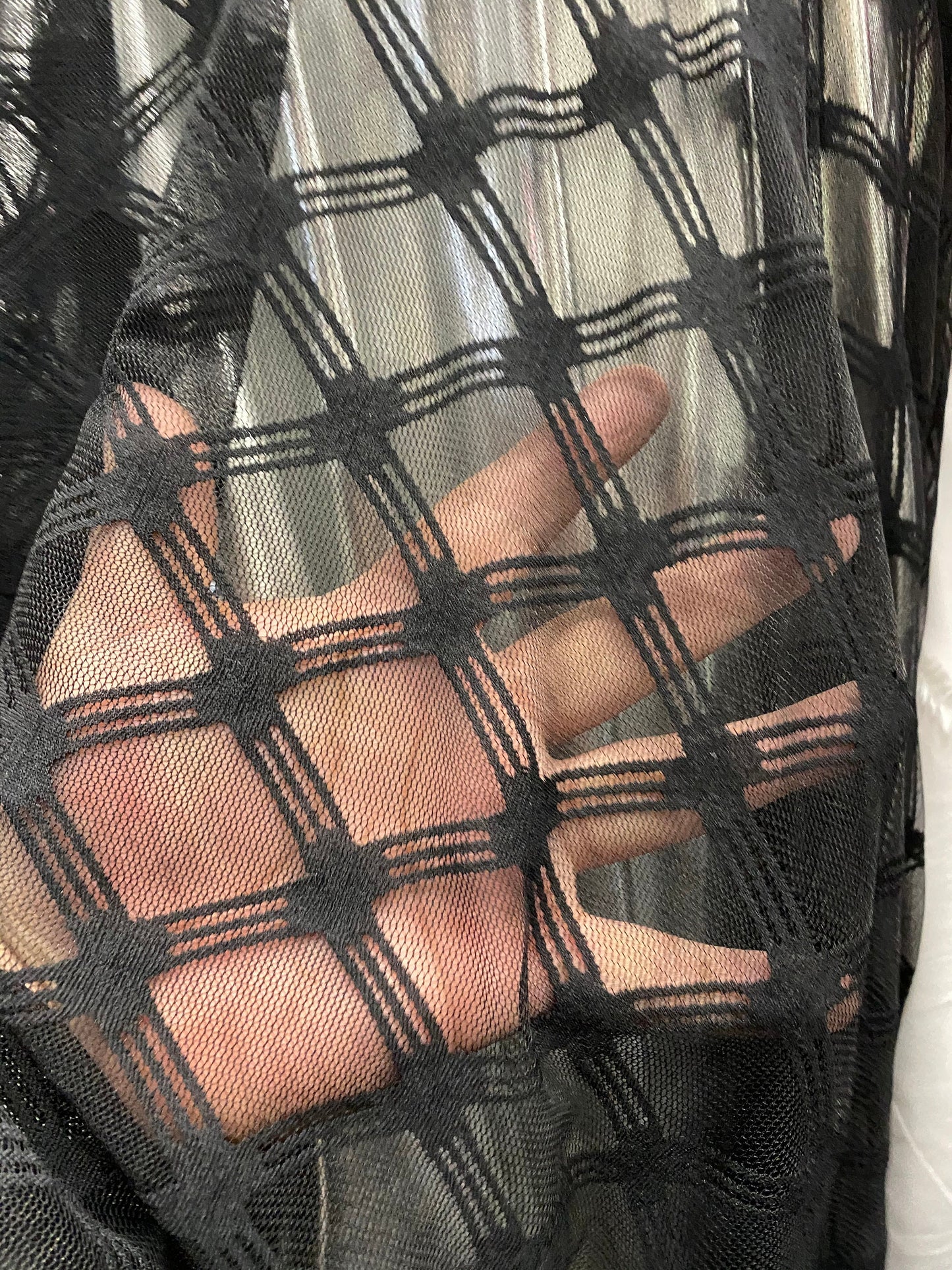 New stretch mesh with diamond design 4-way stretch 58/60” Sold by the YD. Ships worldwide from Los Angeles California USA.