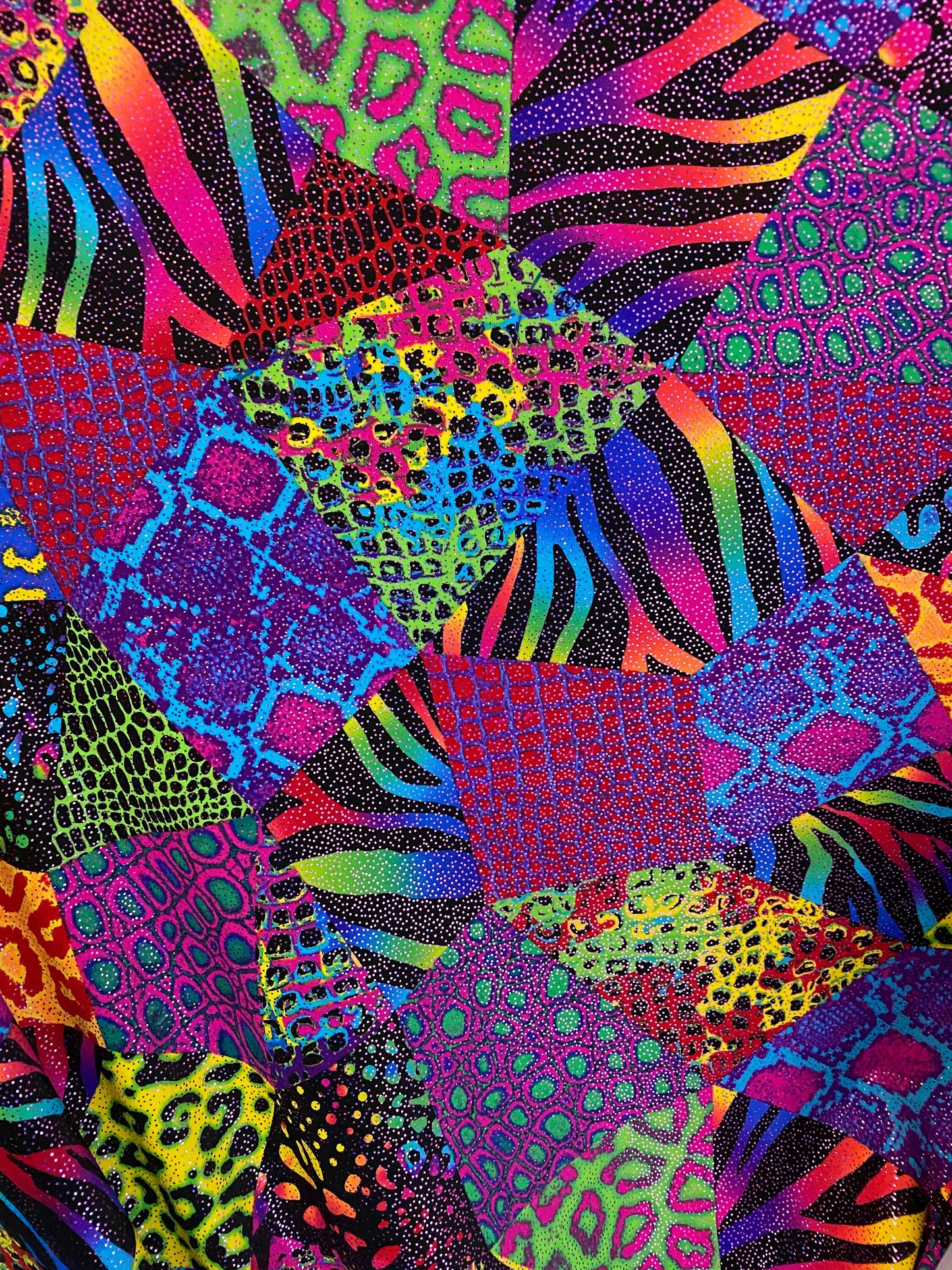 New multicolor Animal print safari design nylon spandex with metallic foil 4-way stretch 58/60” Sold by the YD. Ships worldwide from L.A CA.