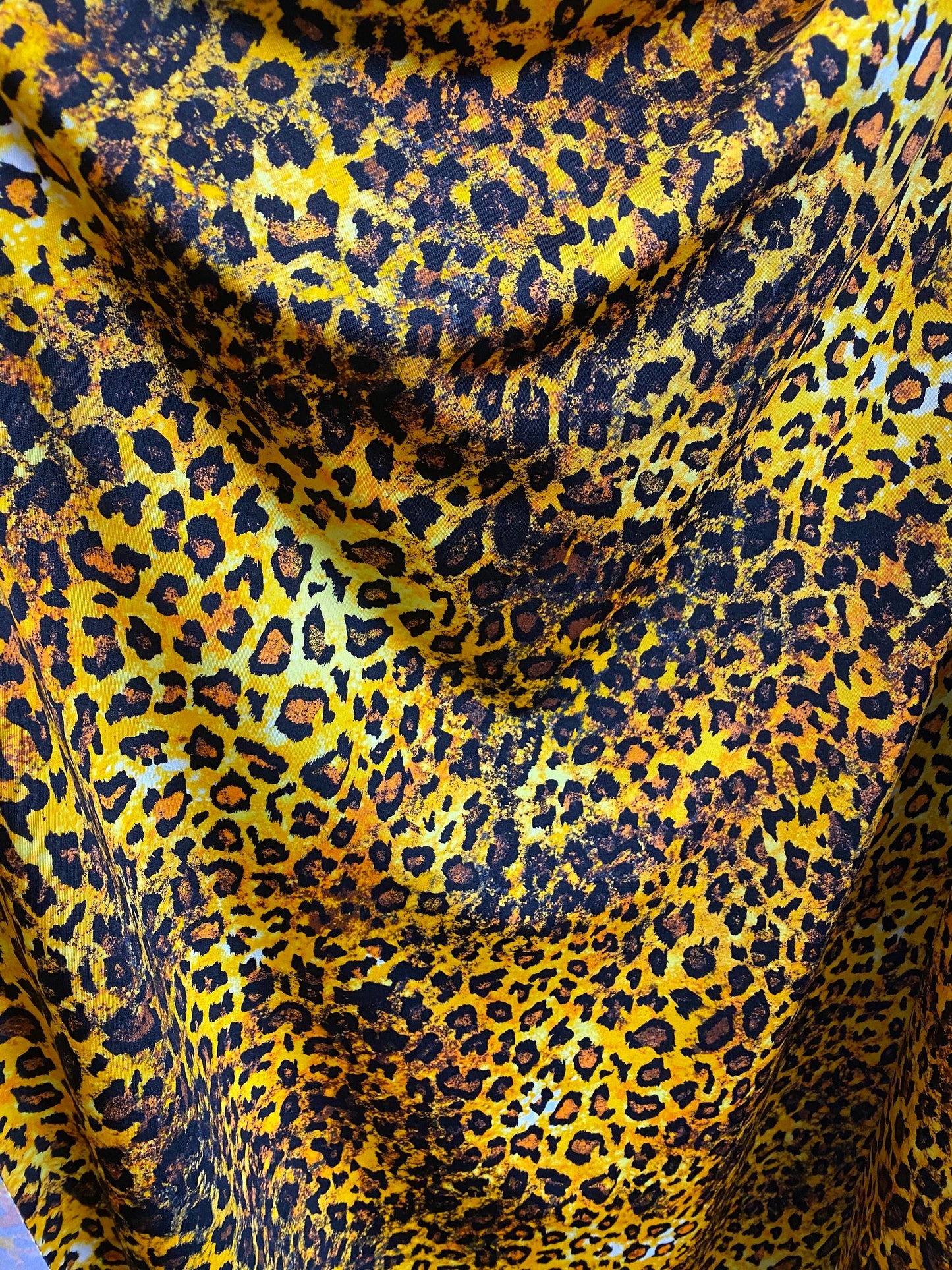 New print nylon spandex animal print leopard design 4-way stretch 58/60” Sold by the YD. Ships worldwide from Los Angeles California USA.