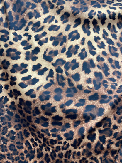 New print nylon spandex leopard design brown/taupe 4-way stretch 58/60” Sold by the YD. Ships worldwide from Los Angeles California USA.