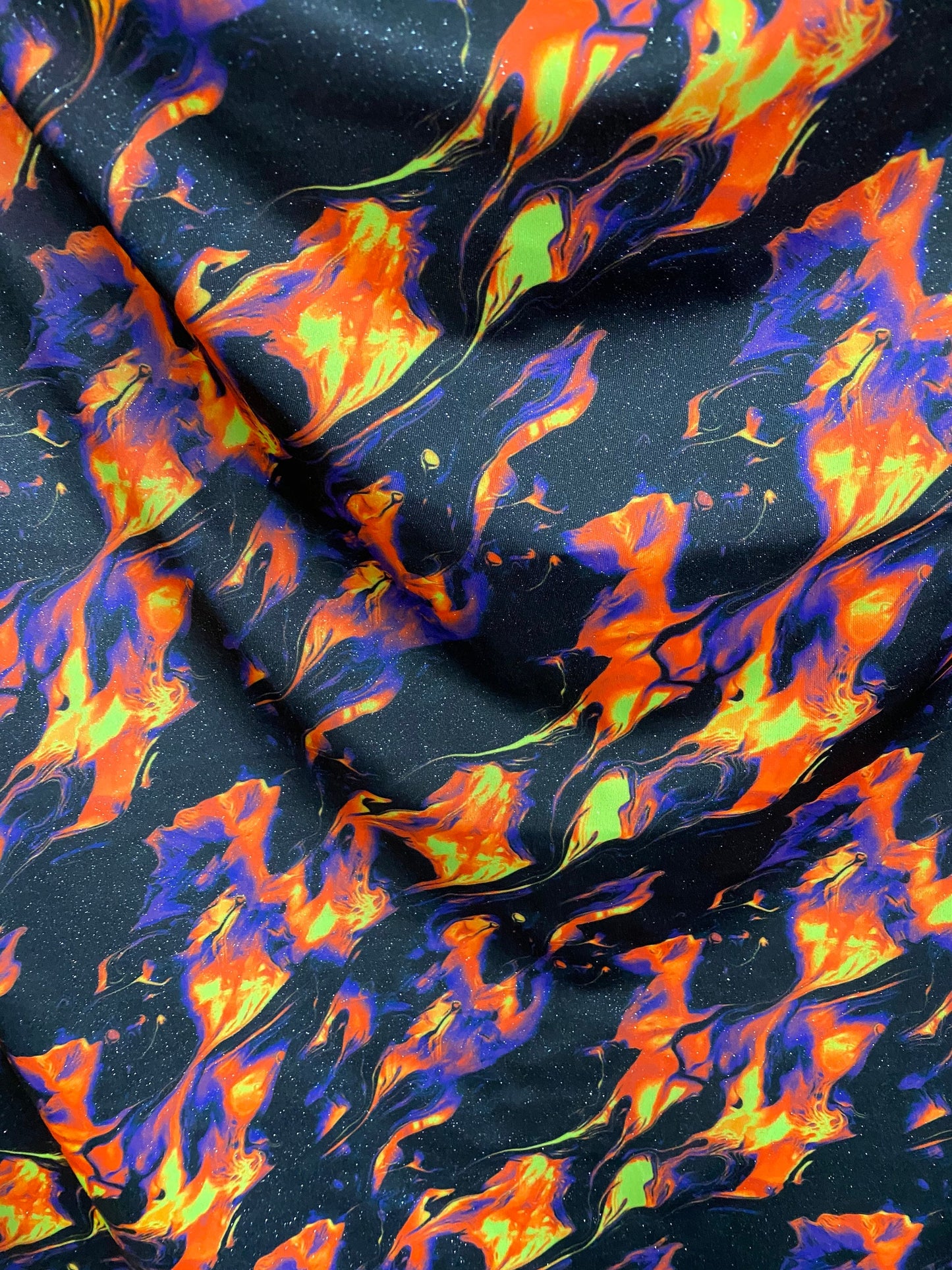 New Hot flames design UV light heavy nylon spandex 4-way stretch 58/60” Sold by the YD. Ships worldwide from Los Angeles California USA.