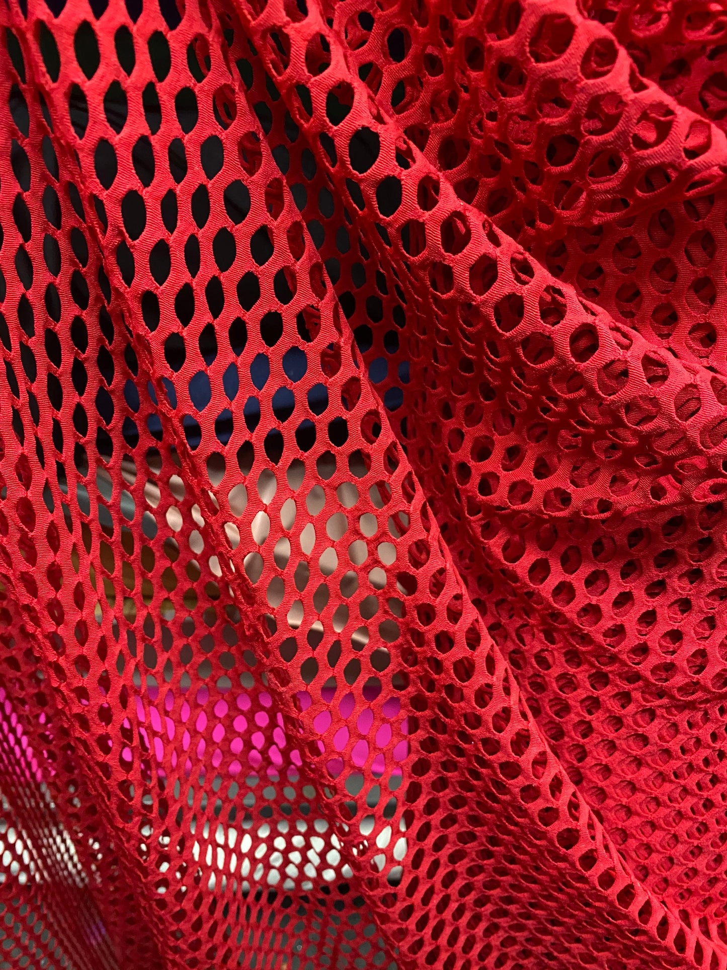 New Red fishnet medium size nylon spandex mesh 4-way 58/60” Sold by the YD. Ships worldwide from Los Angeles California USA.