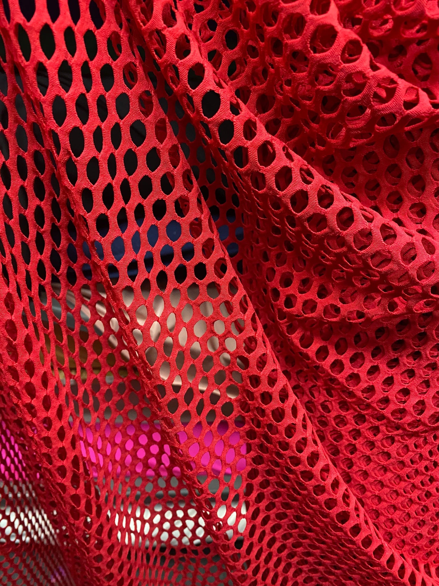 New Red fishnet medium size nylon spandex mesh 4-way 58/60” Sold by the YD. Ships worldwide from Los Angeles California USA.