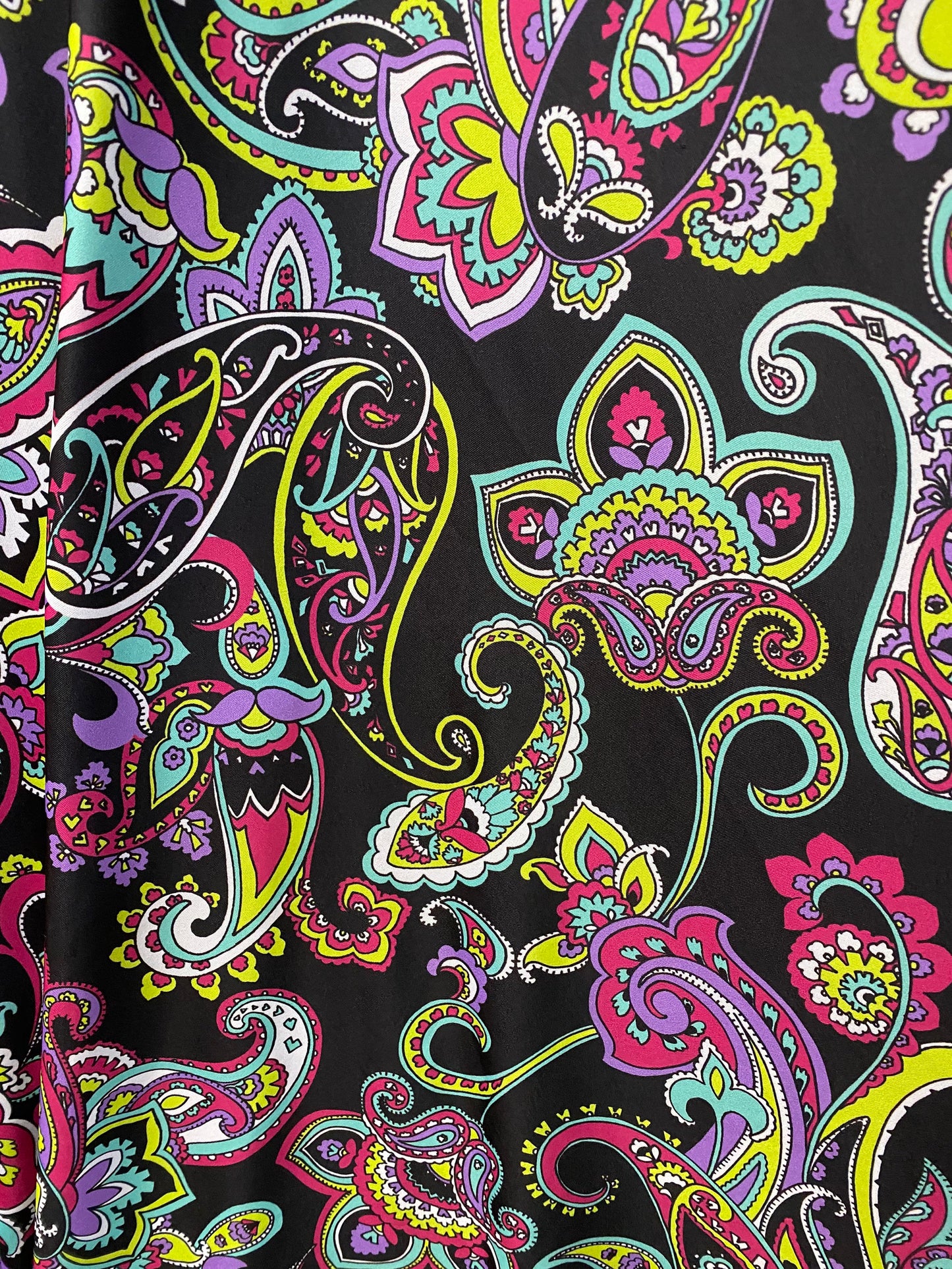 New paisley design print on poly spandex 4-way stretch 58/60” Sold by the YD. Ships worldwide from Los Angeles California USA.