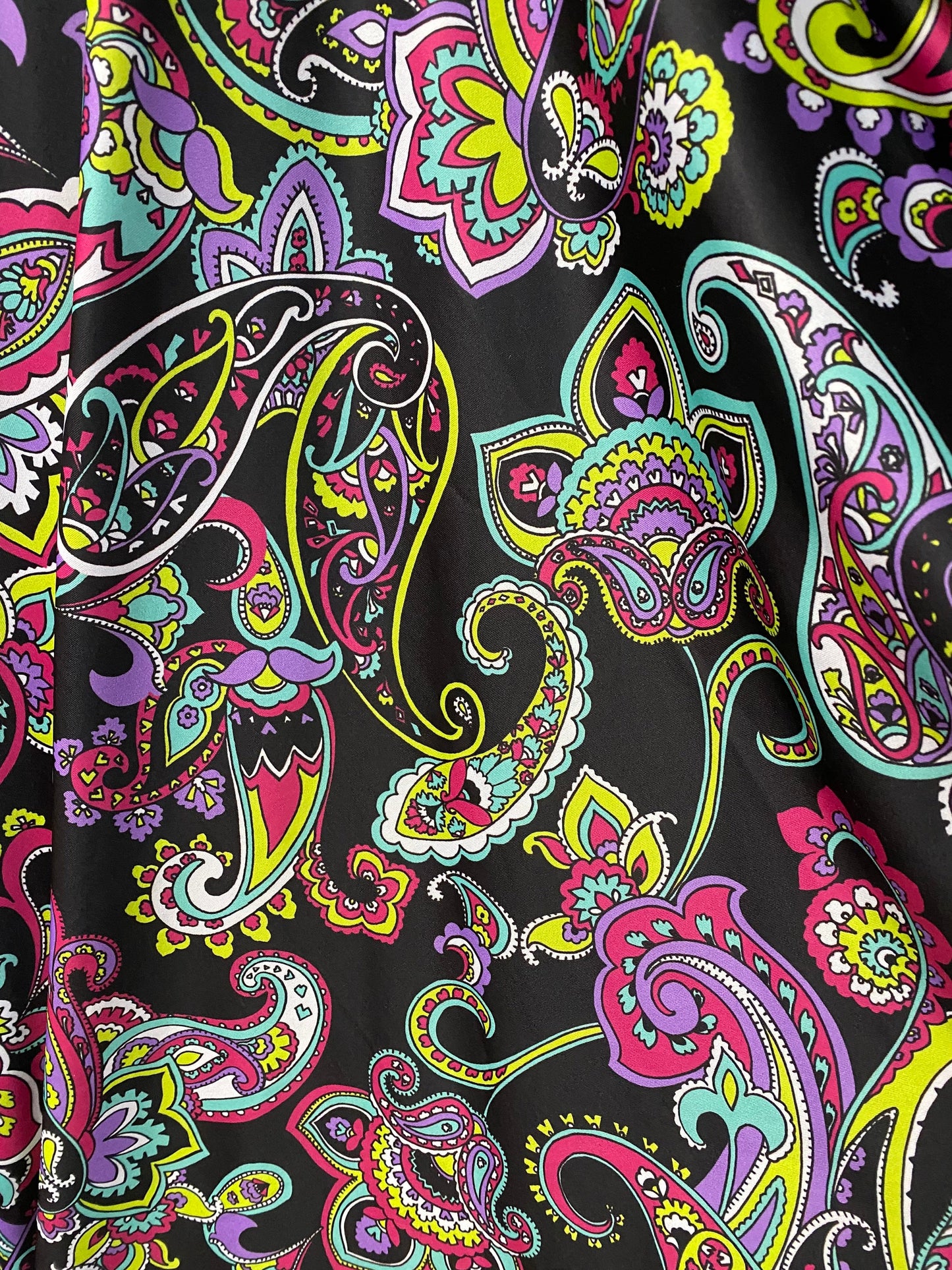 New paisley design print on poly spandex 4-way stretch 58/60” Sold by the YD. Ships worldwide from Los Angeles California USA.