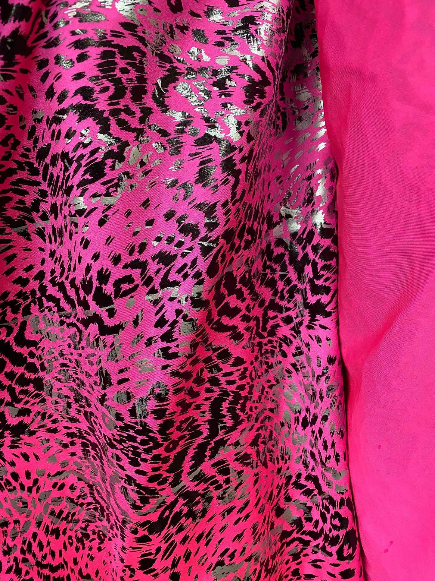 New Exotic animal print metallic nylon spandex pink/black 4-way stretch 58/60” Sold by the YD. Ships worldwide from Los Angeles California.