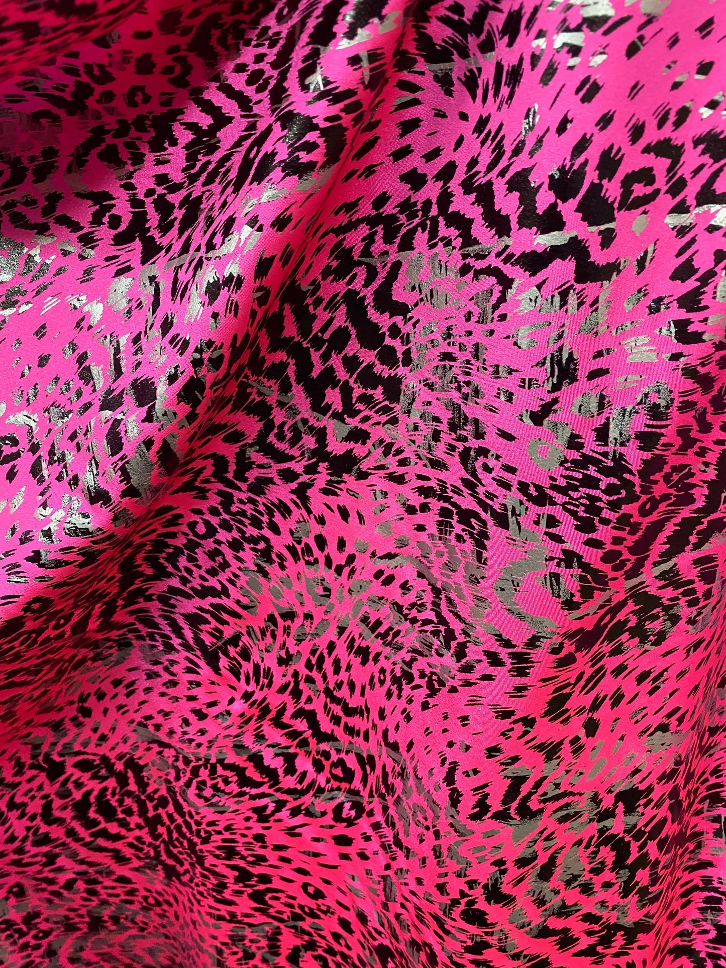 New Exotic animal print metallic nylon spandex pink/black 4-way stretch 58/60” Sold by the YD. Ships worldwide from Los Angeles California.