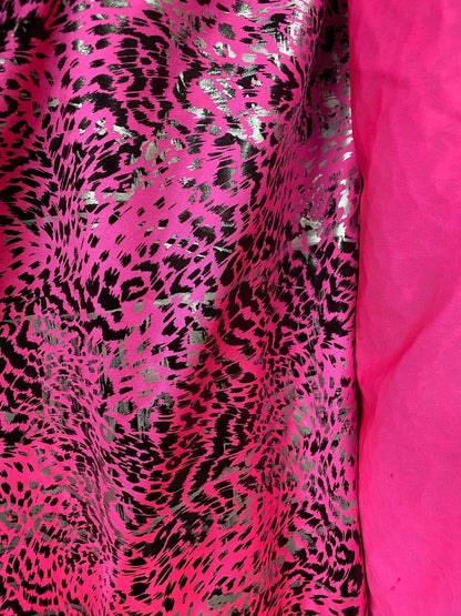 New Exotic animal print metallic nylon spandex pink/black 4-way stretch 58/60” Sold by the YD. Ships worldwide from Los Angeles California.