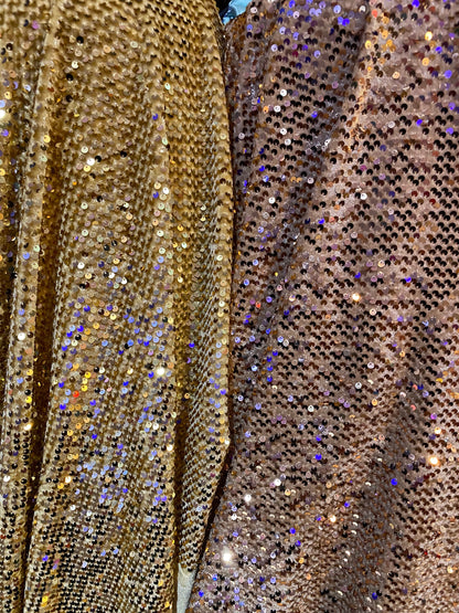 New stretch velvet with hanging sequins all over 2-way stretch 58/60” Sold by the YD. Ships worldwide from Los Angeles California USA.
