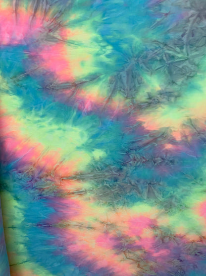 New tie dye poly spandex pastel colors 2-way stretch medium weight 58/60” Sold by the YD. Ships worldwide from Los Angeles California USA.