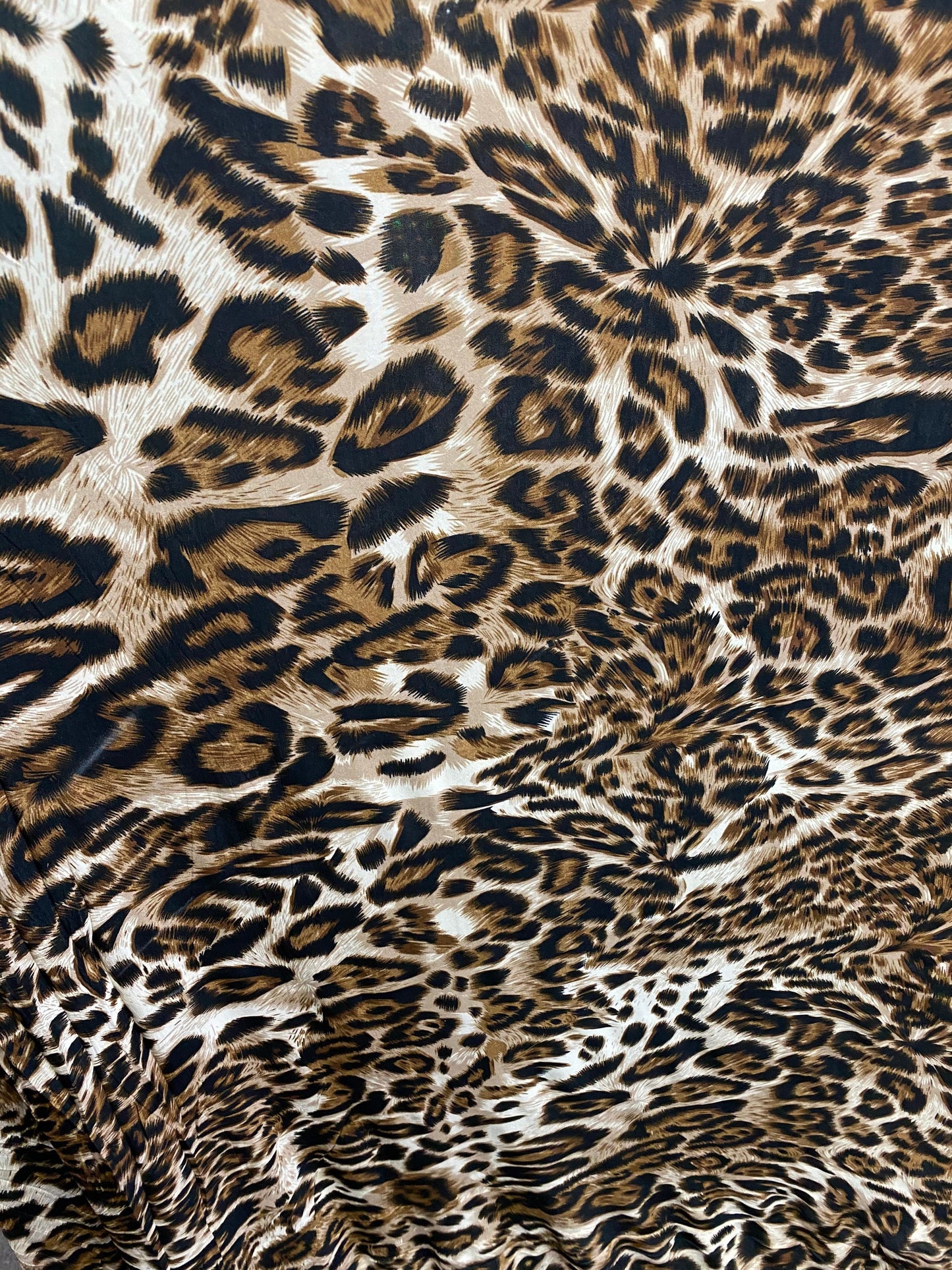 New leopard design print on poly spandex 4-way stretch 58/60” Sold by the YD. Ships worldwide from Los Angeles California USA.