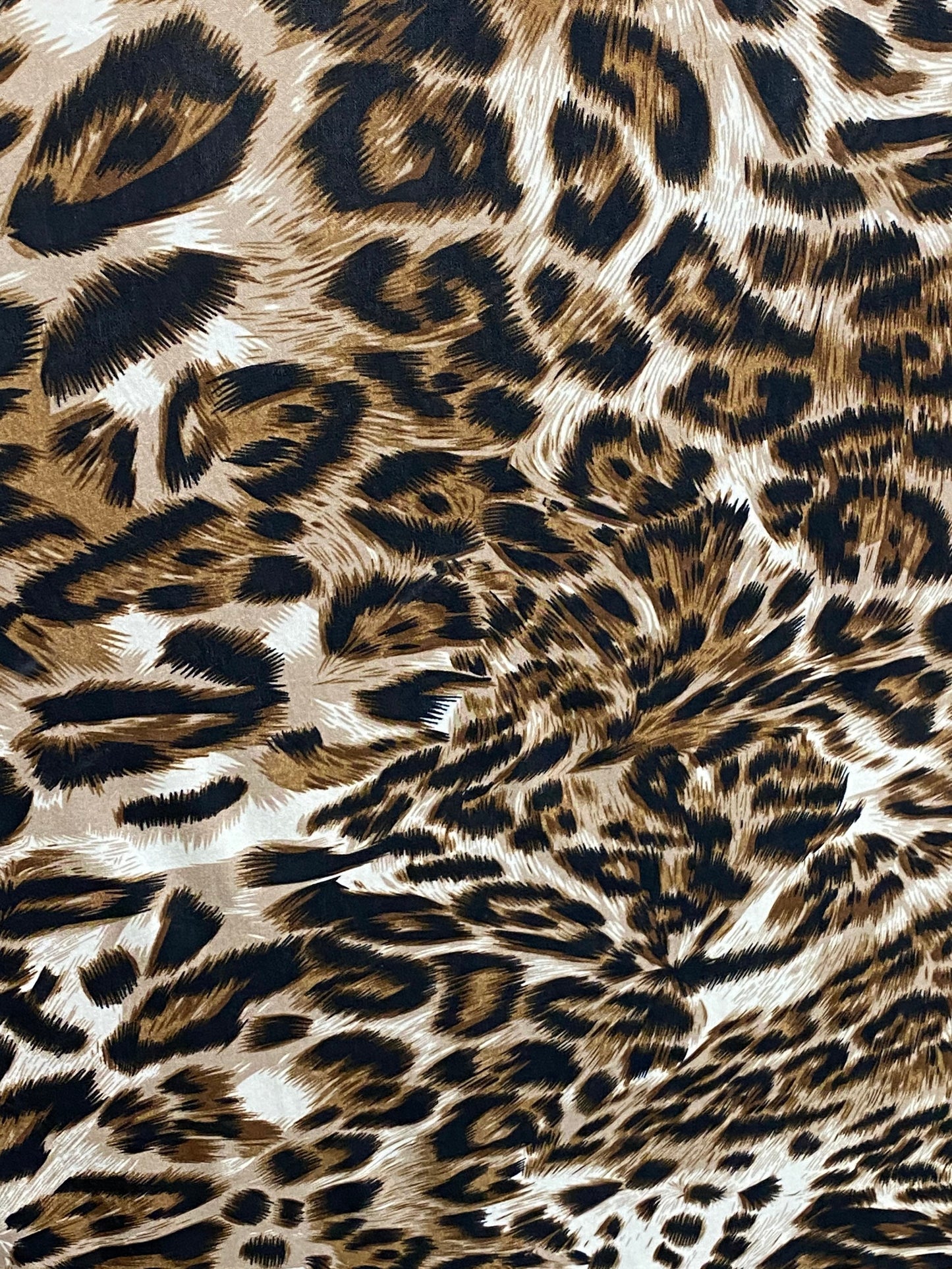 New leopard design print on poly spandex 4-way stretch 58/60” Sold by the YD. Ships worldwide from Los Angeles California USA.