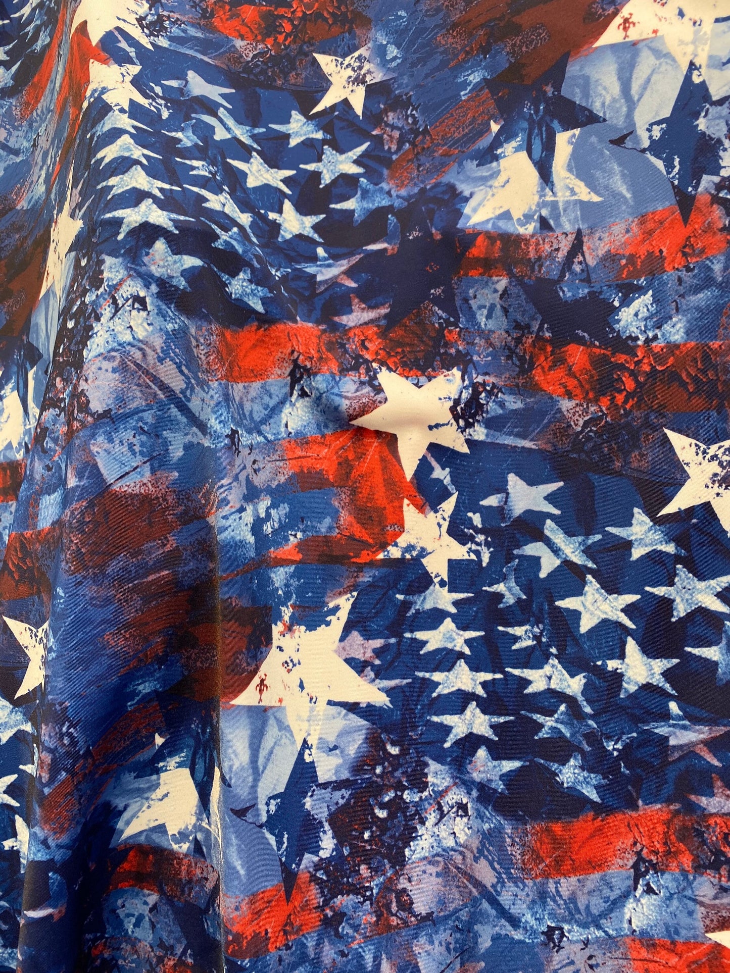 New patriotic star design print on nylon spandex 4-way stretch 58/60” Sold by the YD. Ships worldwide from Los Angeles California USA.