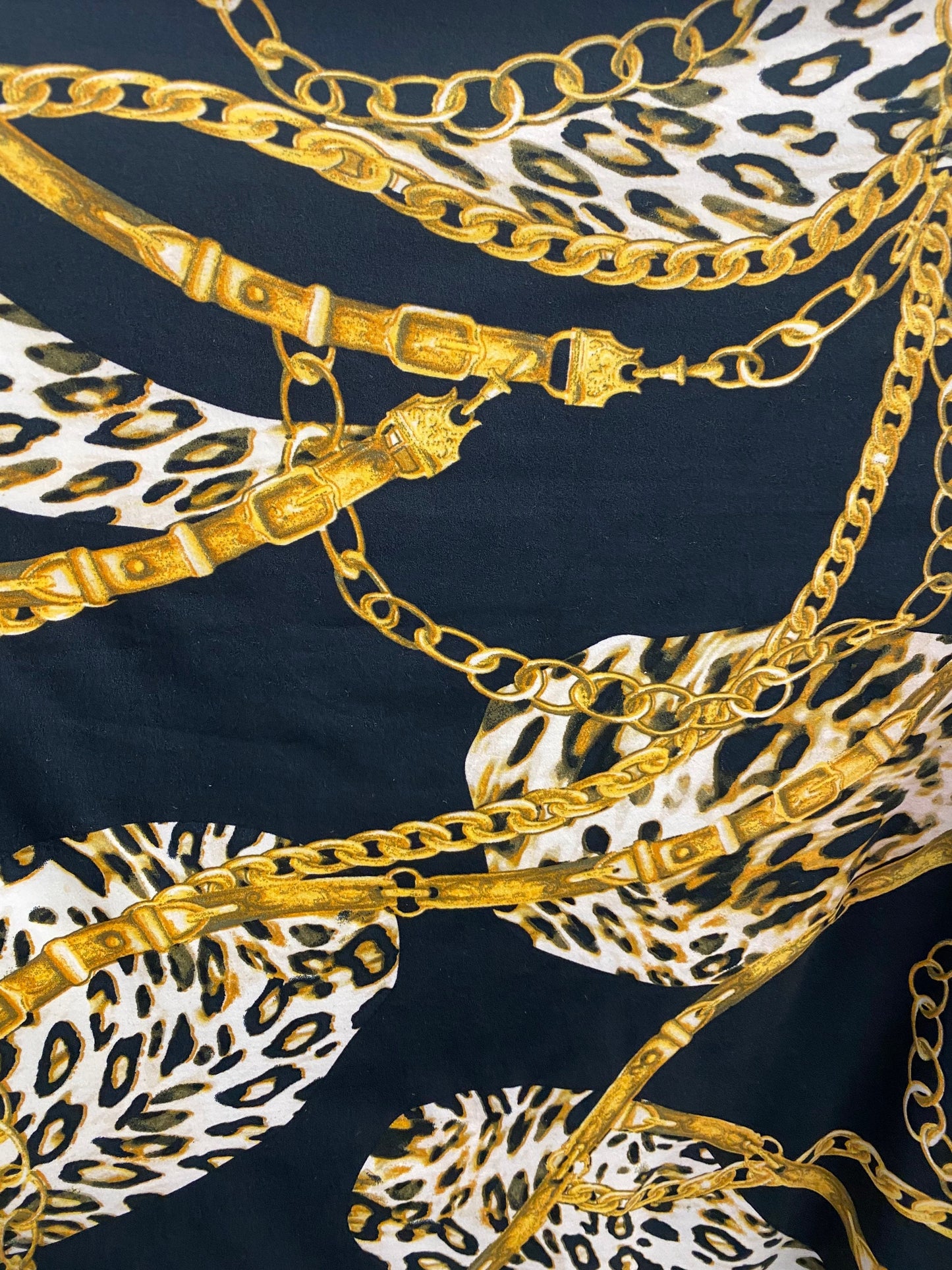 New Black and Gold print Chains all over on DTY brush 4-way stretch poly spandex fabric 58/60” Sold by the YD. Ships Los Ángeles CA.